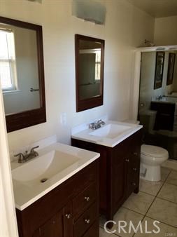 19111 Stonegate Road Hidden Valley Lake, CA 95467 - Photo 6 of 15 a bathroom with a sink vanity and a mirror