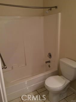 19111 Stonegate Road Hidden Valley Lake, CA 95467 - Photo 9 of 15 a white toilet sitting next to a bath tub