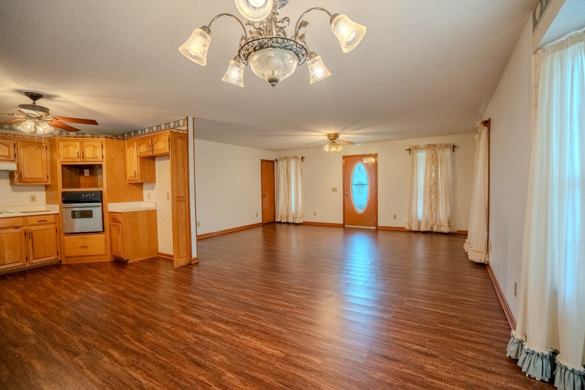 145 Lantz Road Lawrenceburg, TN 38464 - Photo 21 of 42 a view of a livingroom with wooden floor