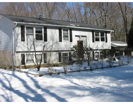 88 Pelham Road Amherst, MA 01002 - Photo 2 of 8 a front view of a house with sitting area