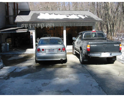 88 Pelham Road Amherst, MA 01002 - Photo 8 of 8 a car parked in front of a building