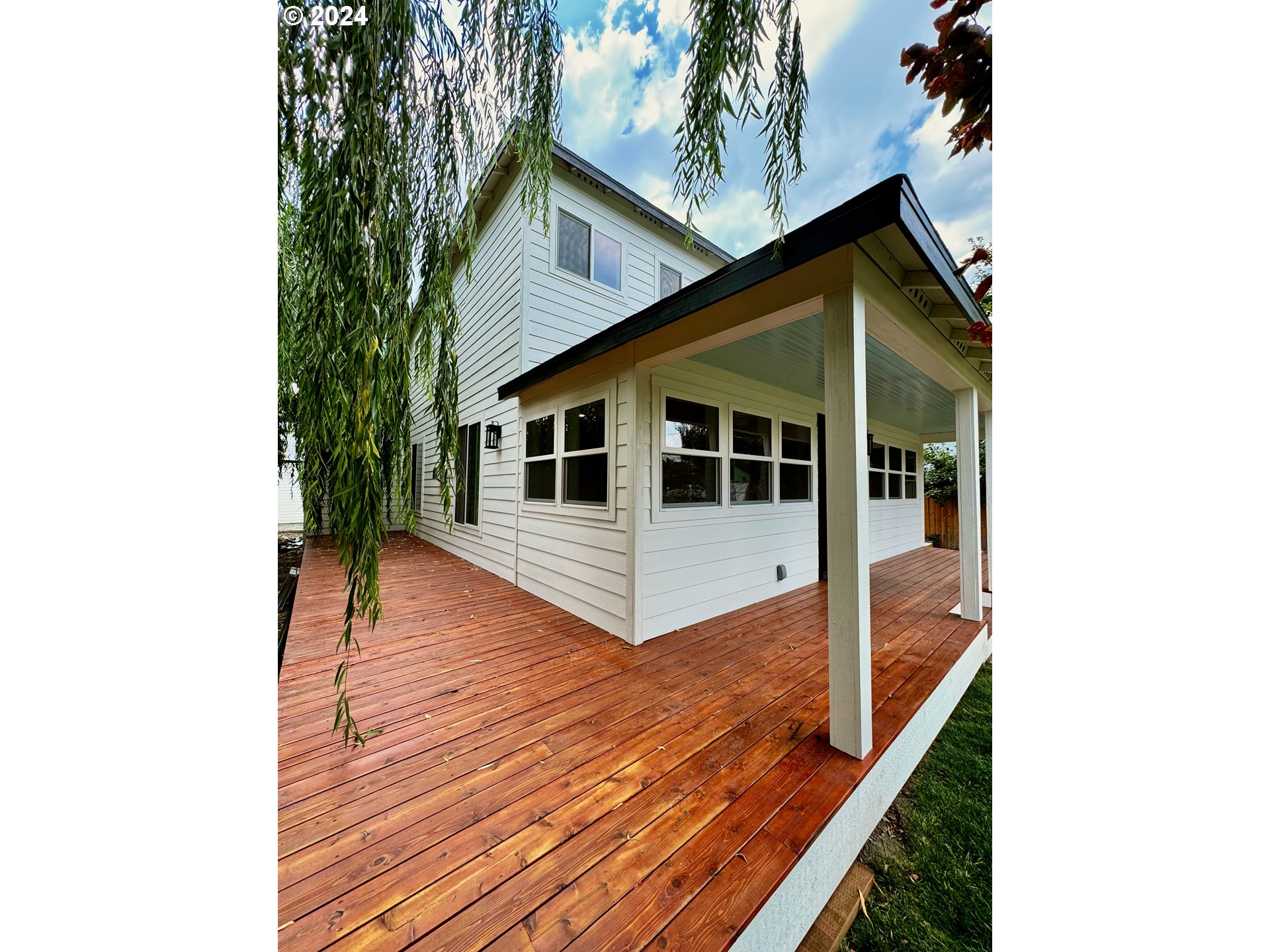 a house view with a outdoor space