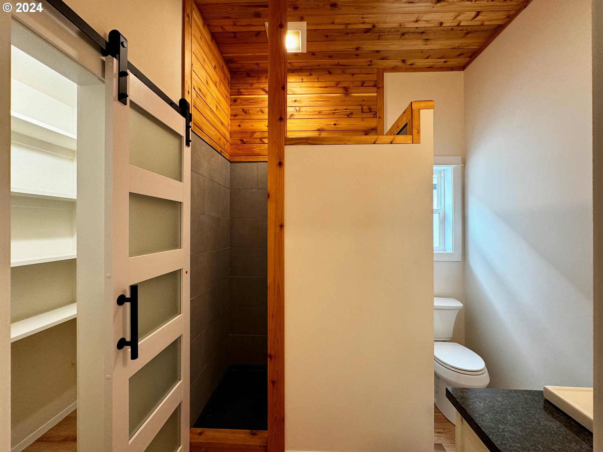 2231 3rd Street Baker City, OR 97814 - Photo 13 of 48 a bathroom with a toilet and a shower
