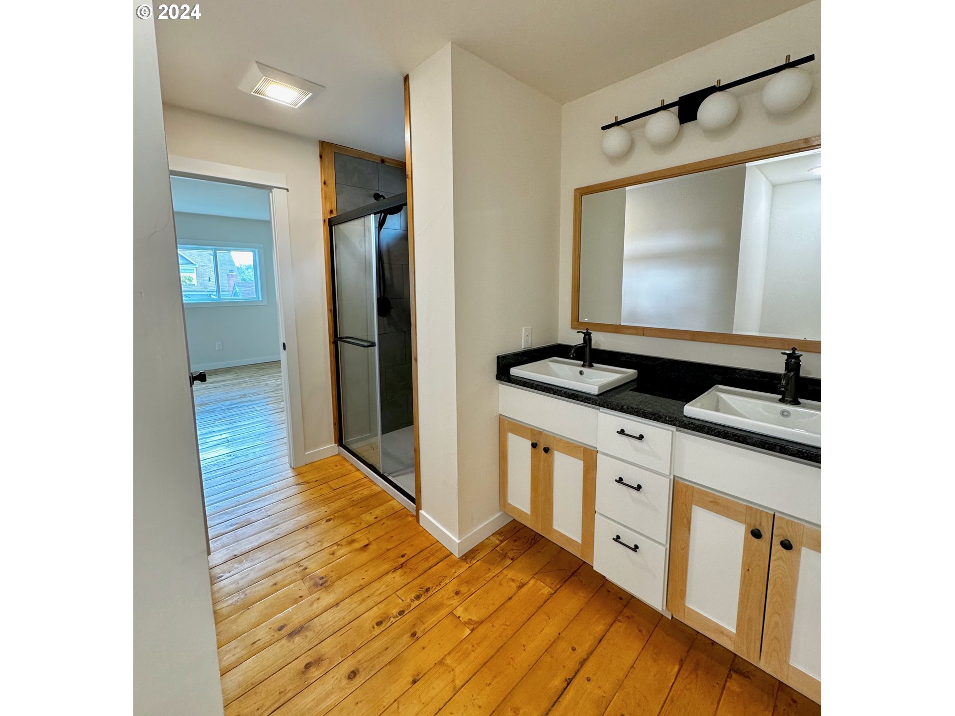 2231 3rd Street Baker City, OR 97814 - Photo 33 of 48 a kitchen with stainless steel appliances granite countertop a refrigerator and a stove