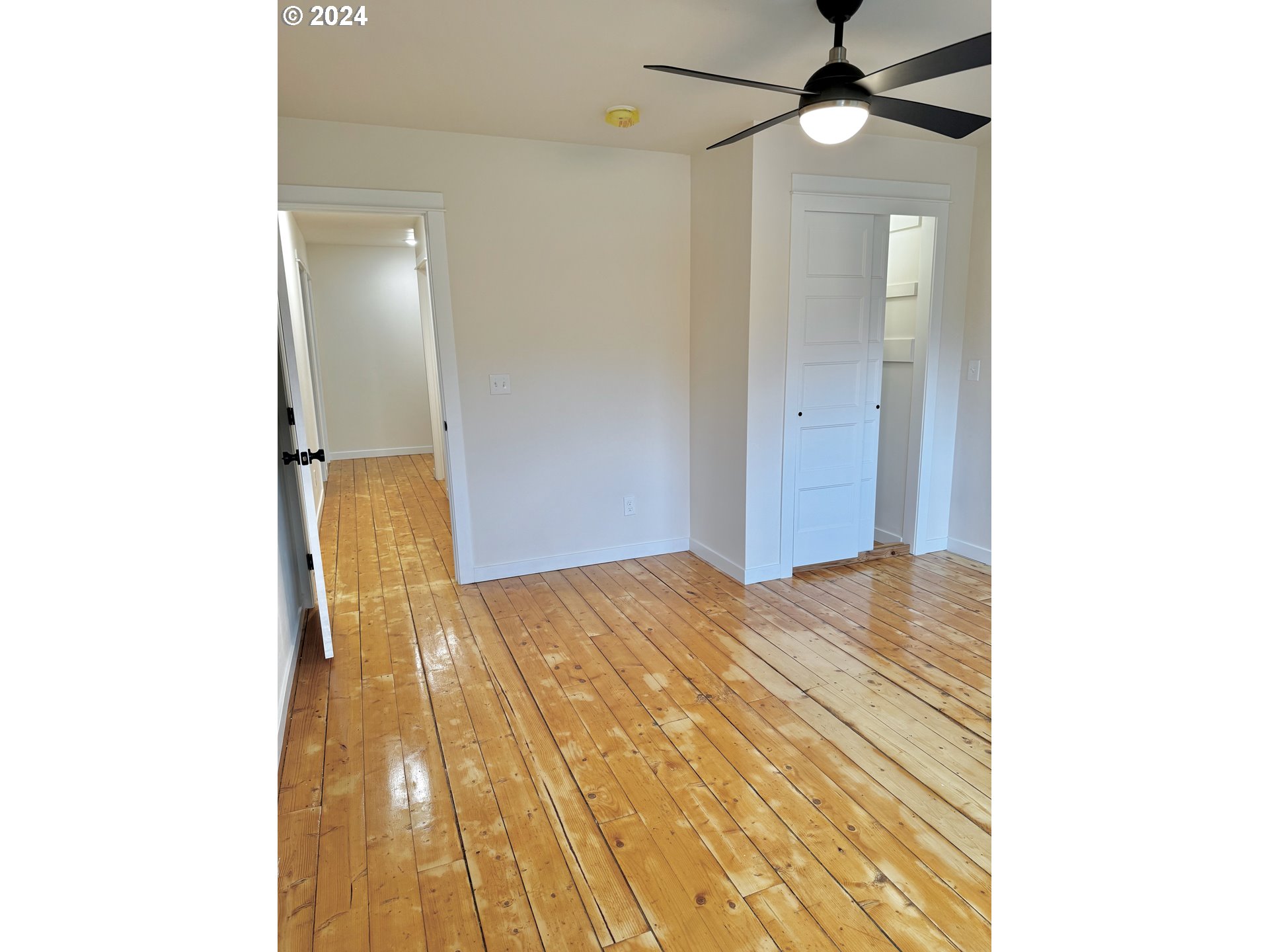 2231 3rd Street Baker City, OR 97814 - Photo 40 of 48 a view of a bedroom with a bed and cabinets