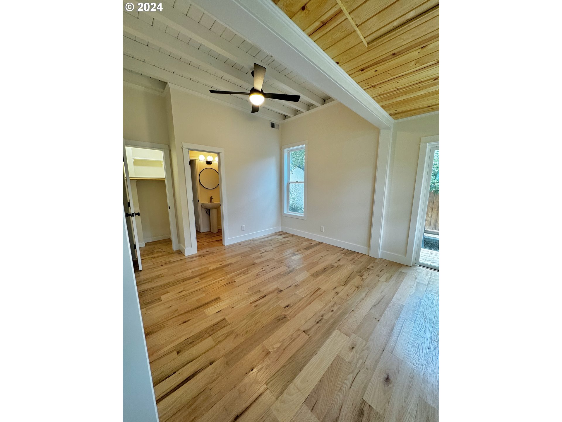 2231 3rd Street Baker City, OR 97814 - Photo 4 of 48 a view of a hallway with wooden floor
