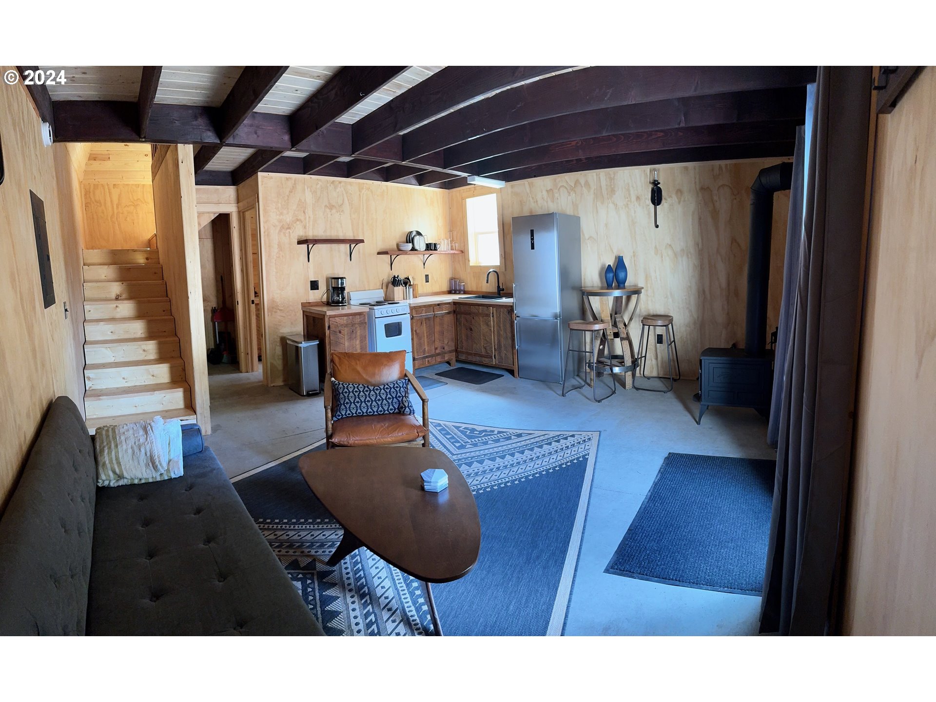 2231 3rd Street Baker City, OR 97814 - Photo 45 of 48 a living room with furniture and a window
