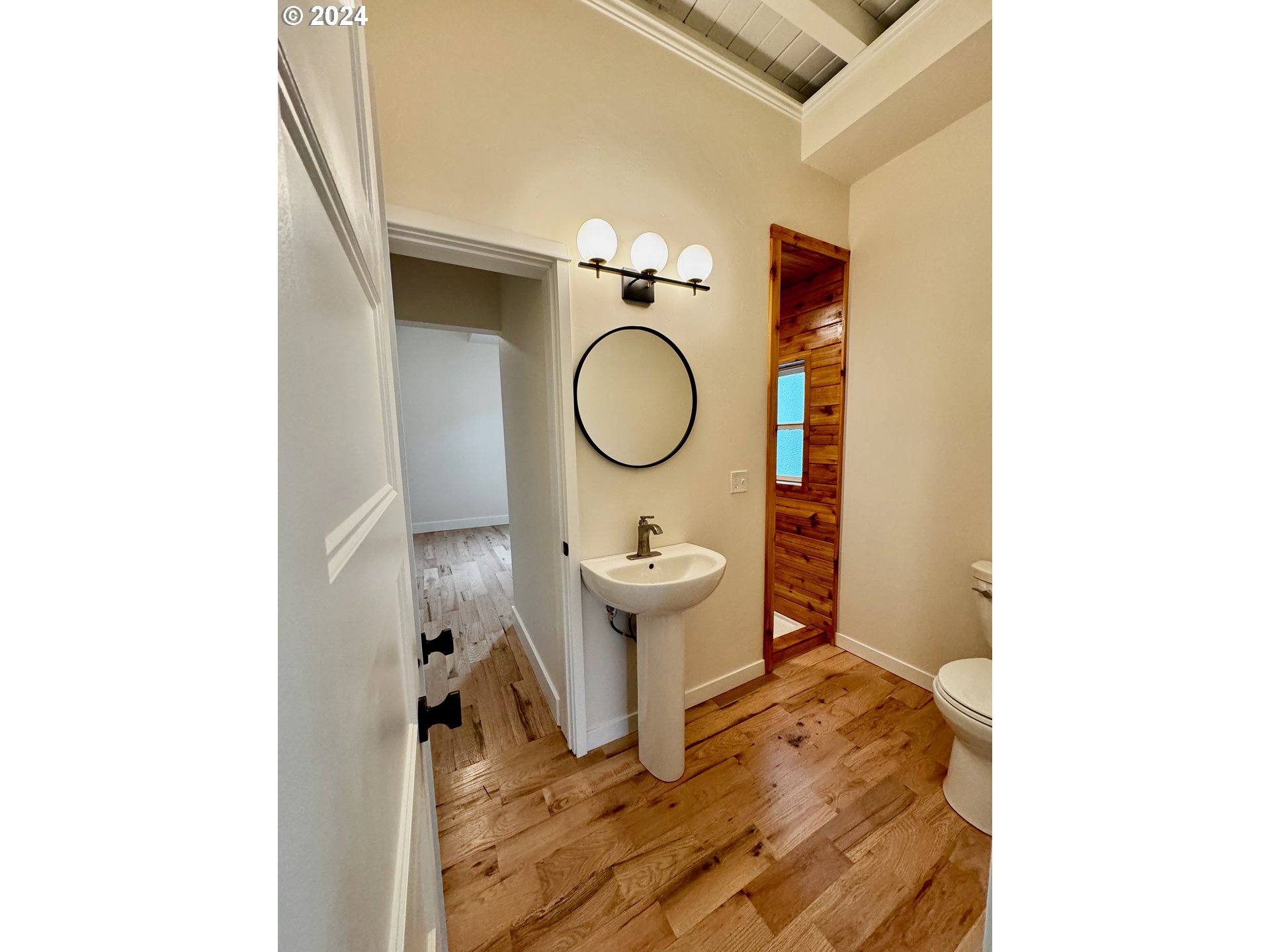 2231 3rd Street Baker City, OR 97814 - Photo 8 of 48 a living room with a sink and a mirror