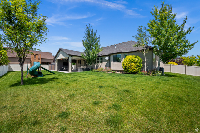 4077 Rons Court Riverton, UT 84096 - Photo 40 of 48 A backyard like this is becoming increasingly rare—beautifully maintained, generously sized, and ready to be enjoyed.