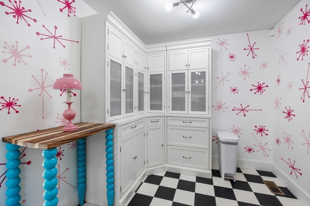 18 Carlton Road Bourne, MA 02532 - Photo 16 of 41 a white kitchen with a sink and cabinets