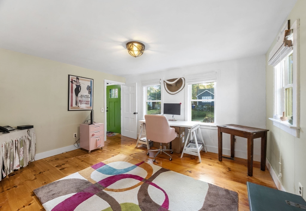 18 Carlton Road Bourne, MA 02532 - Photo 18 of 41 a work room with furniture and wooden floor
