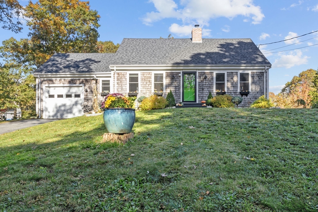 18 Carlton Road Bourne, MA 02532 - Photo 2 of 41 a view of a house with backyard sitting area and garden