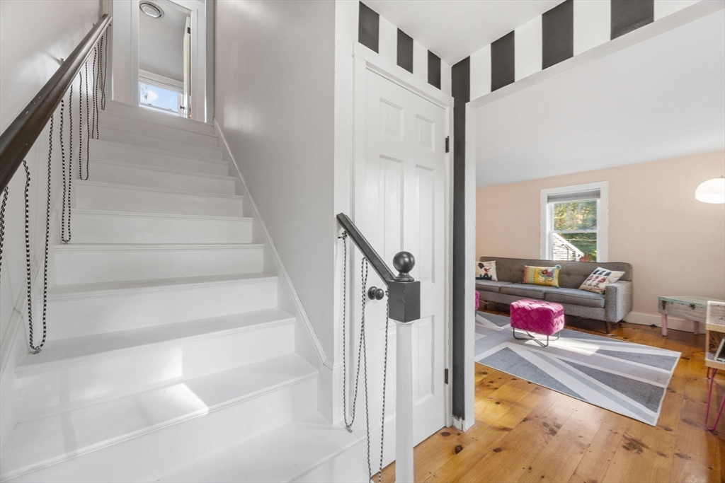 18 Carlton Road Bourne, MA 02532 - Photo 22 of 41 a view of entryway bedroom and hall with wooden floor