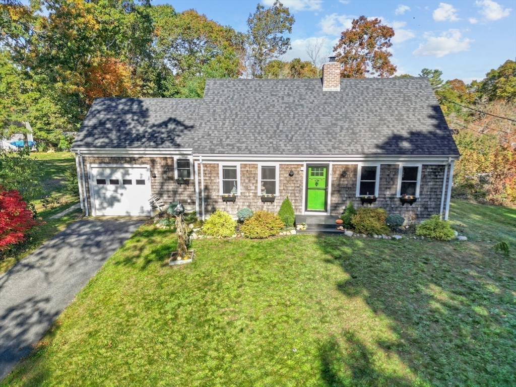 18 Carlton Road Bourne, MA 02532 - Photo 32 of 41 a aerial view of a house with swimming pool and garden