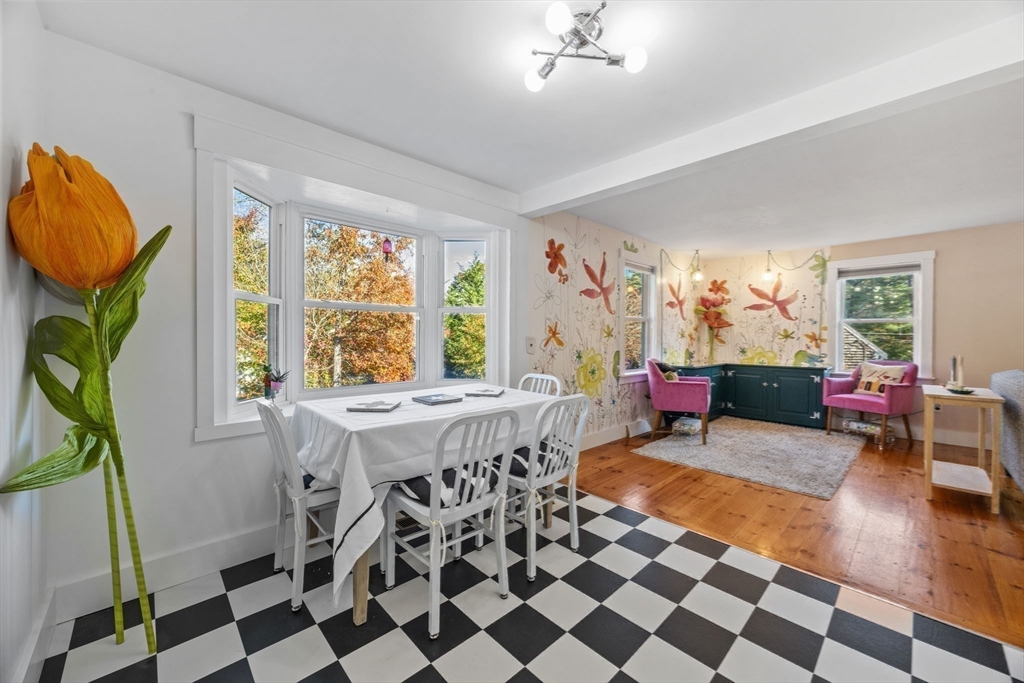 18 Carlton Road Bourne, MA 02532 - Photo 9 of 41 a living room with furniture and a large window