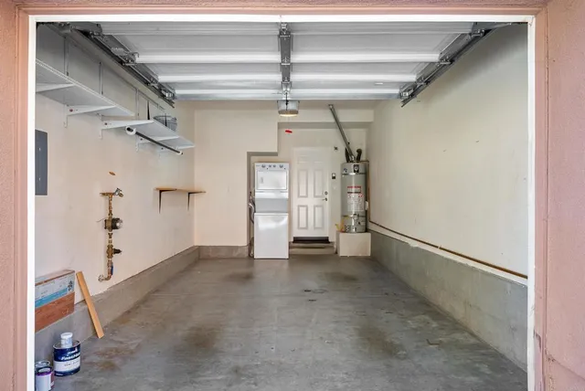 a view of a swimming pool with an outdoor seating and a yard