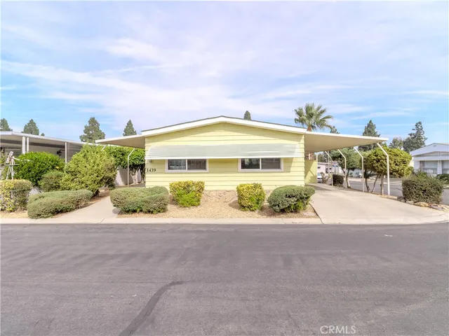 front view of a house with a street