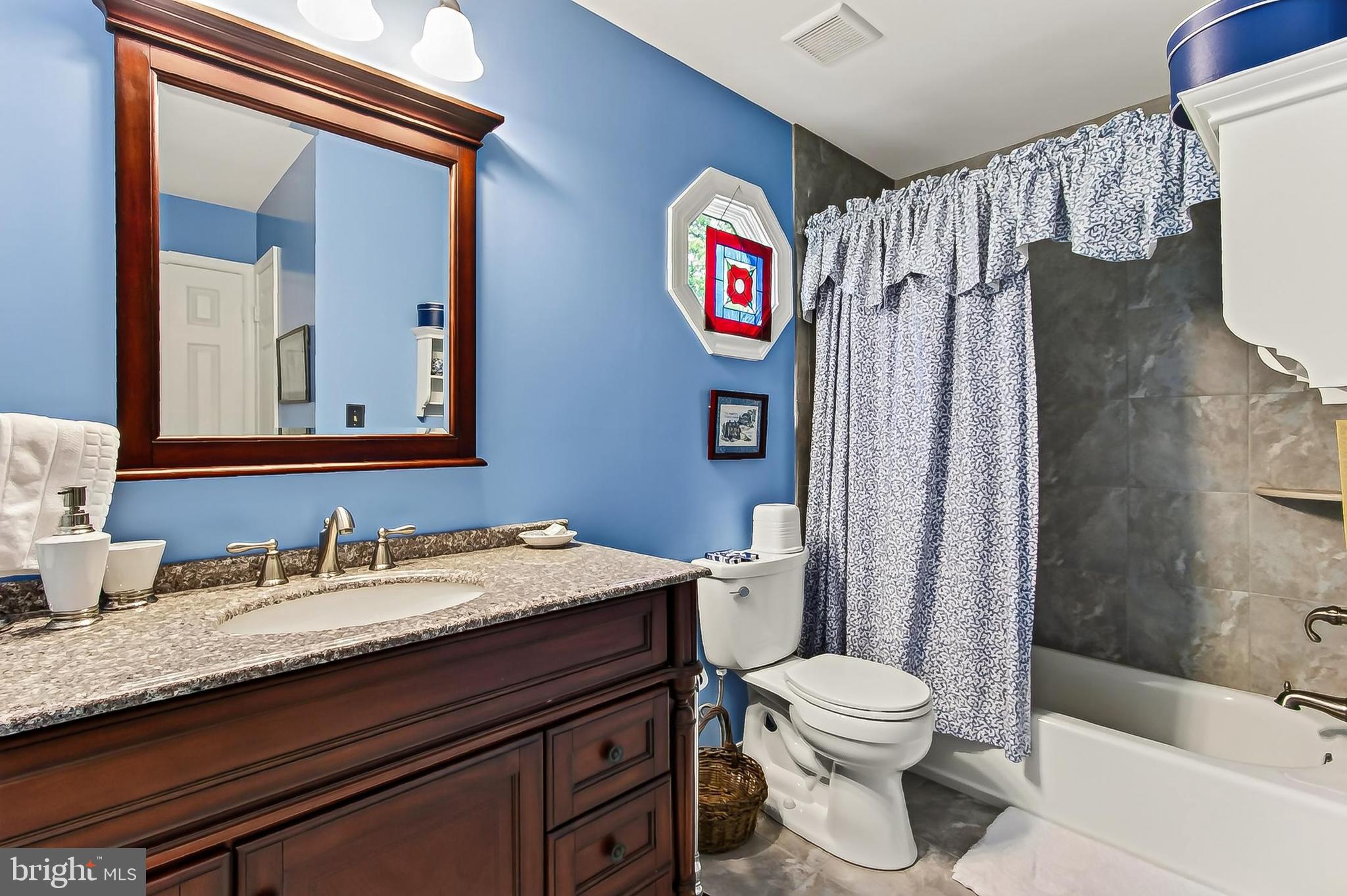 7606 Davis Field Lane Springfield, VA 22153 - Photo 37 of 55 Hall bath redone-tile to the ceiling