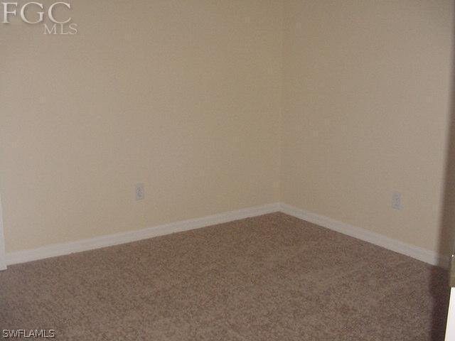 717 Alabama Road South Lehigh Acres, FL 33974 - Photo 9 of 9 a view of an empty room
