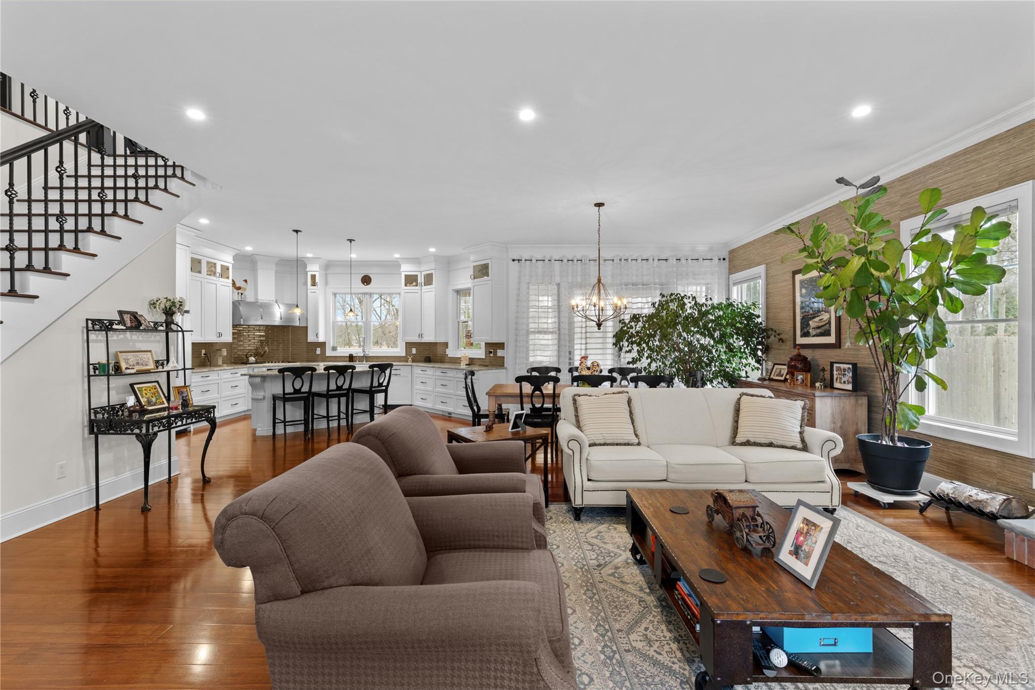 360 Masters Road Laurel, NY 11948 - Photo 11 of 49 a living room with furniture and a large window