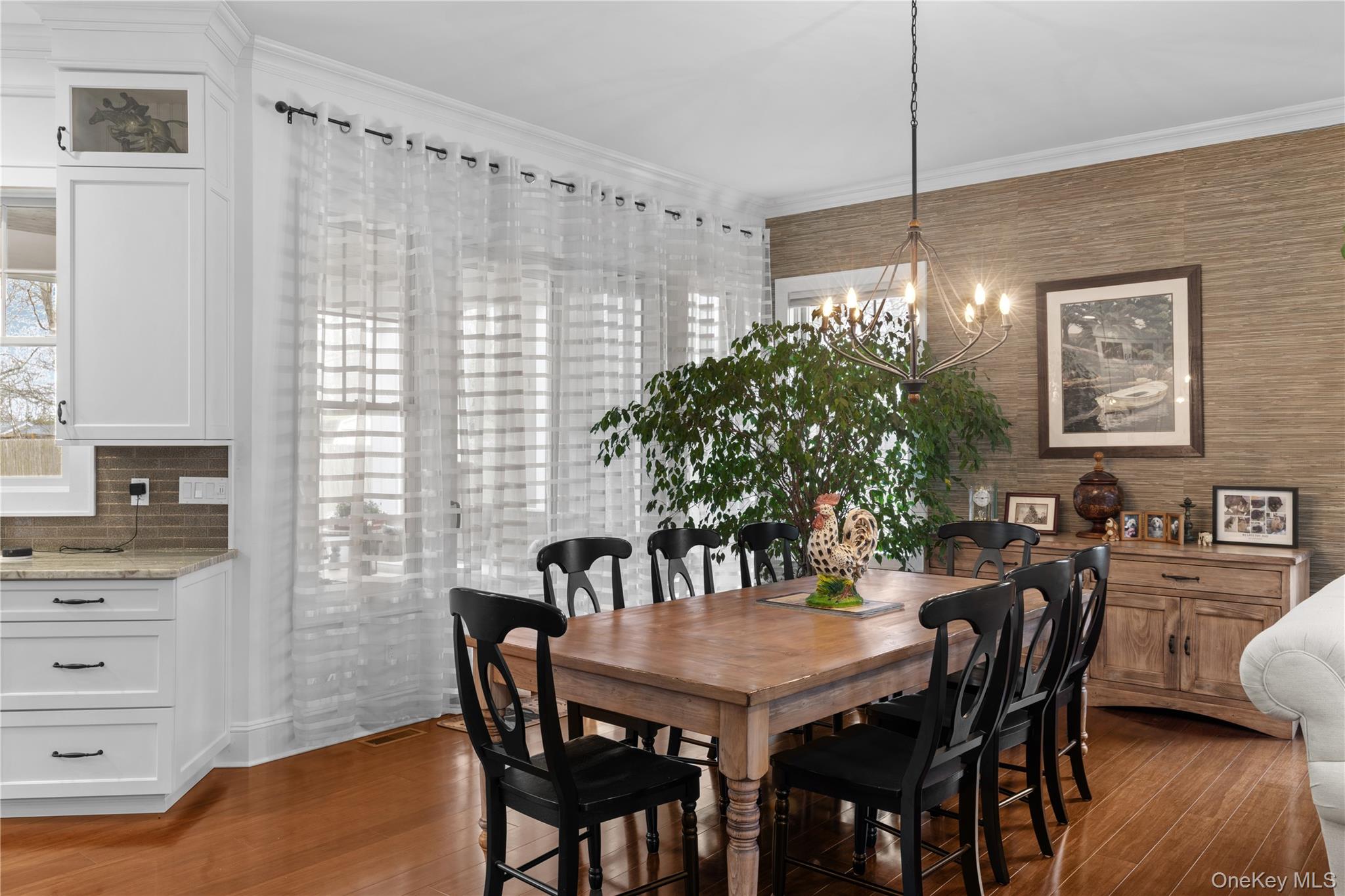360 Masters Road Laurel, NY 11948 - Photo 14 of 49 a view of a dining room with furniture