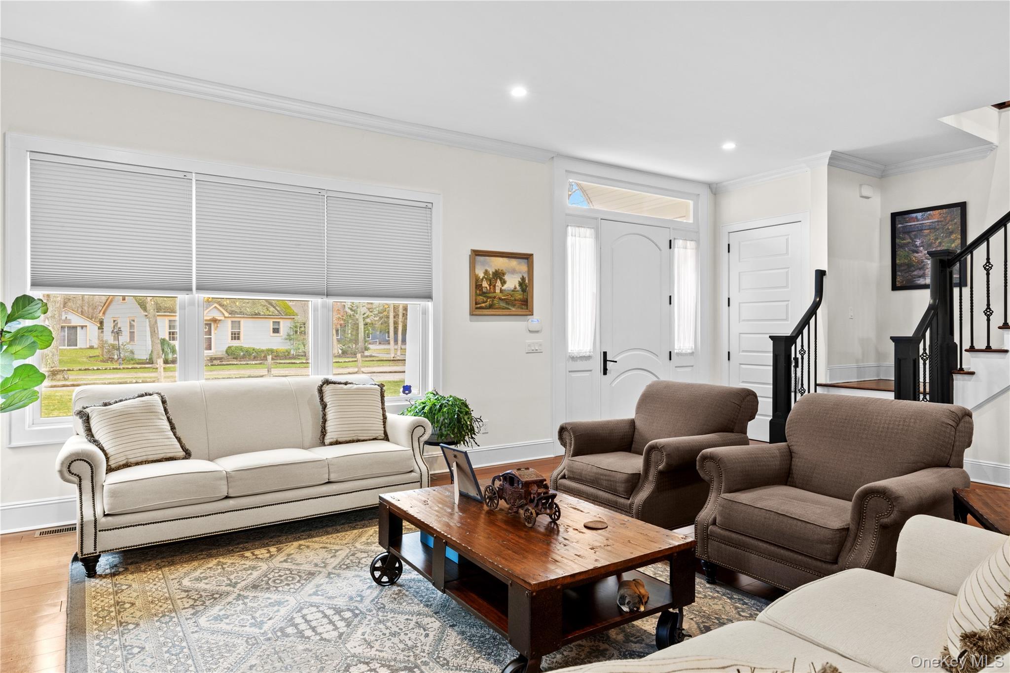 360 Masters Road Laurel, NY 11948 - Photo 9 of 49 a living room with furniture a rug and a window