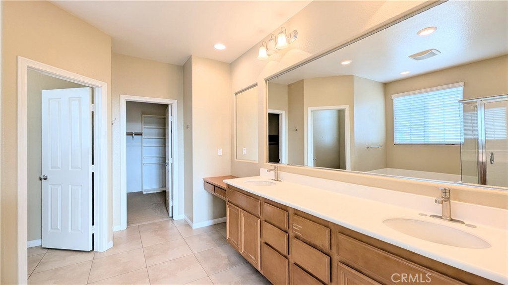 1169 Parkview Drive Oceanside, CA 92057 - Photo 11 of 27 a spacious bathroom with a sink and a mirror