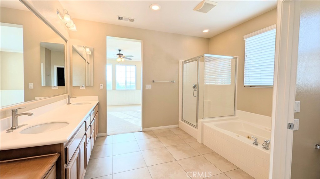 1169 Parkview Drive Oceanside, CA 92057 - Photo 13 of 27 a bathroom with a granite countertop sink a mirror and a shower