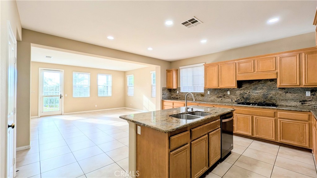 1169 Parkview Drive Oceanside, CA 92057 - Photo 3 of 27 a kitchen with a sink stove and cabinets