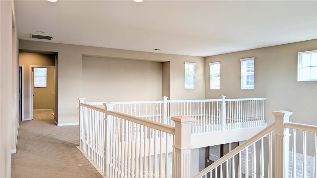 1169 Parkview Drive Oceanside, CA 92057 - Photo 8 of 27 a view of staircase with white walls and a window