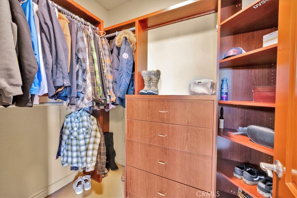 7959 Stephenson Lane Yucca Valley, CA 92284 - Photo 45 of 75 a view of walk in closet with clothes and shoes