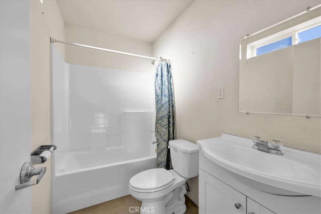 7959 Stephenson Lane Yucca Valley, CA 92284 - Photo 68 of 75 a bathroom with a sink toilet and shower