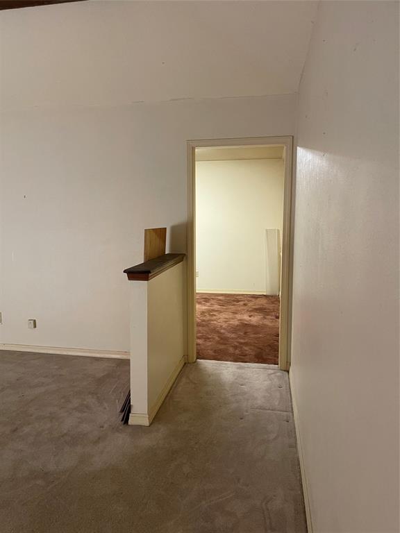122 Post Oak Drive Mansfield, LA 71052 - Photo 9 of 23 Hallway with carpet floors and baseboards