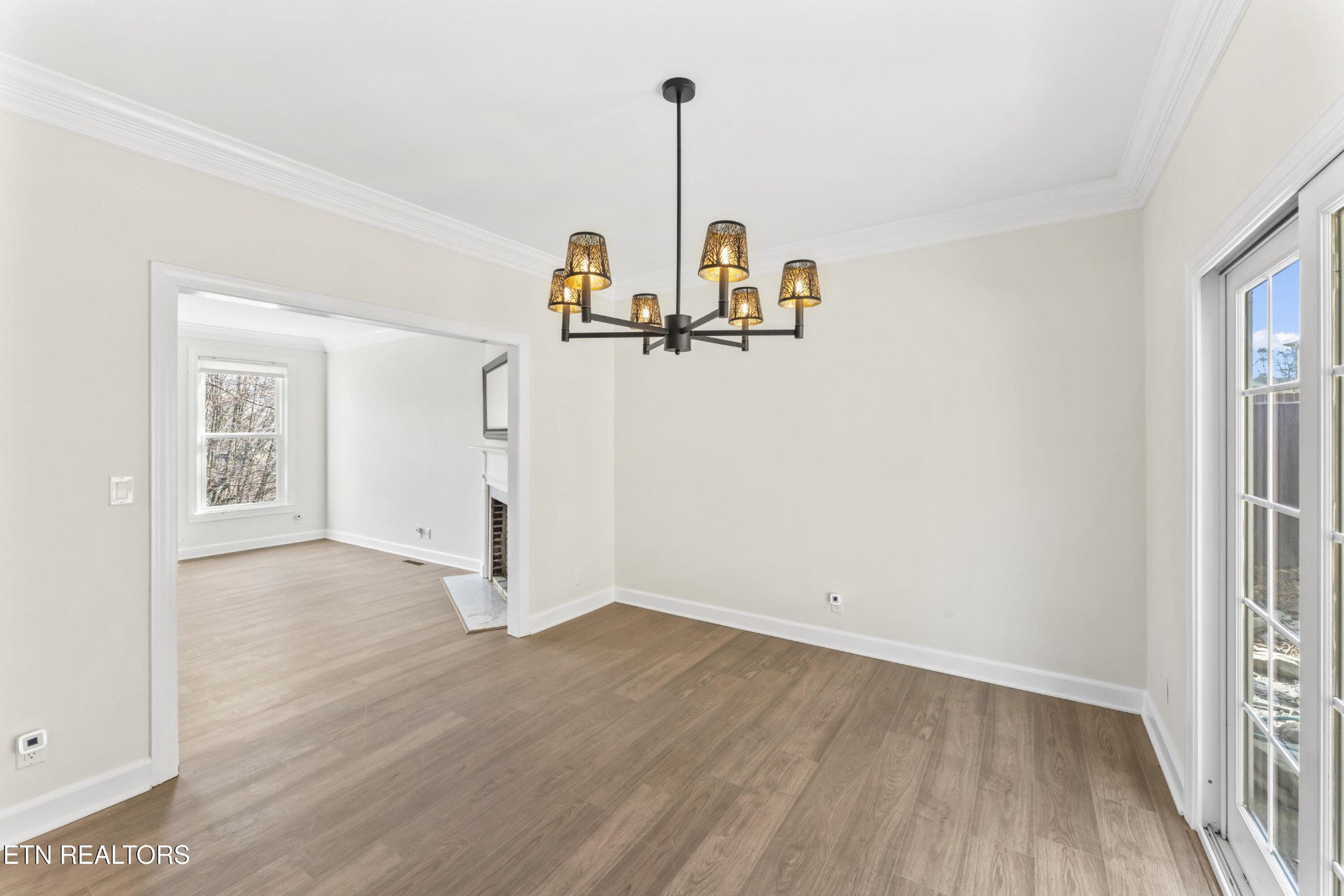 103 Amanda Place Oak Ridge, TN 37830 - Photo 12 of 38 a view of empty room with wooden floor and window