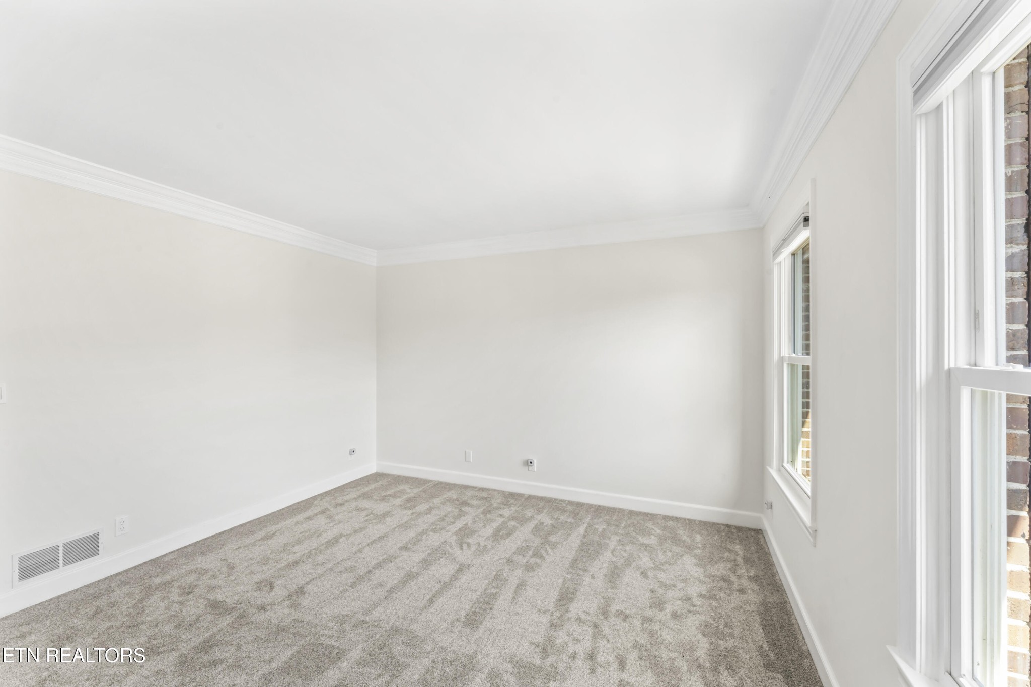 103 Amanda Place Oak Ridge, TN 37830 - Photo 24 of 38 an empty room with a workbench