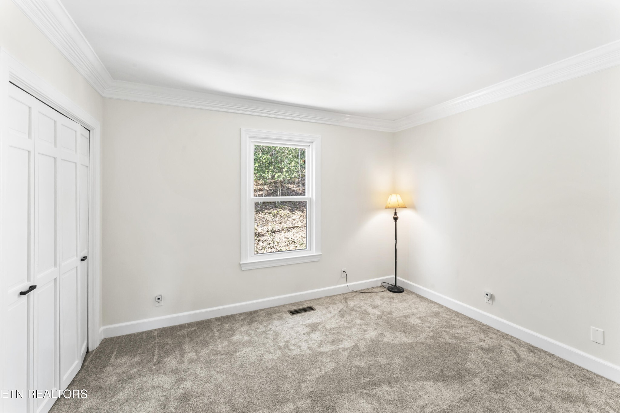 103 Amanda Place Oak Ridge, TN 37830 - Photo 28 of 38 an empty room with a empty space and a window