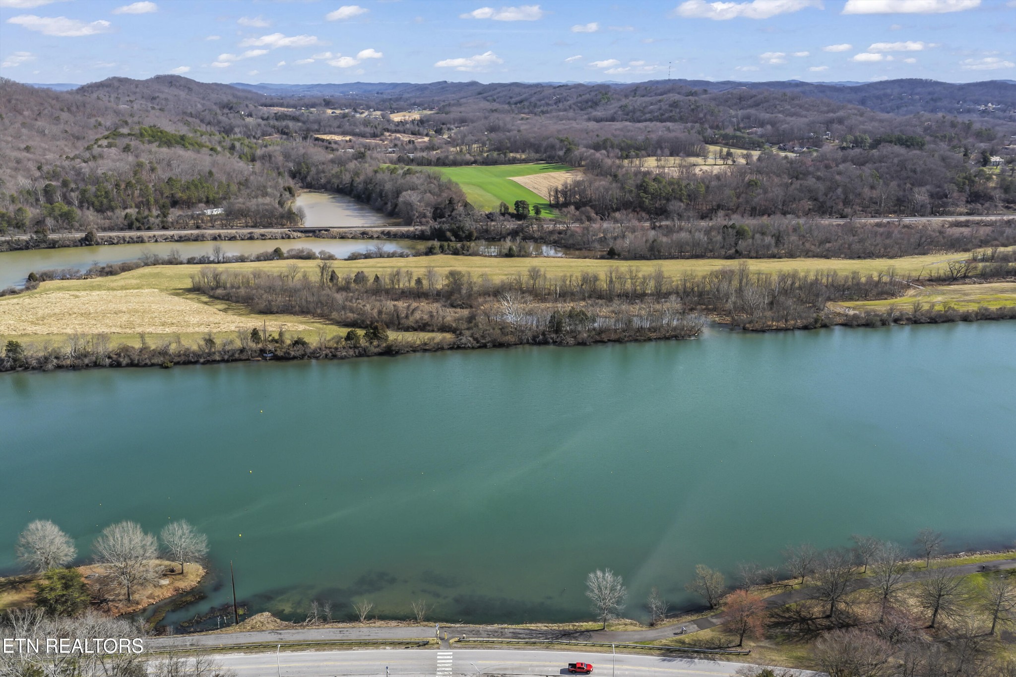 103 Amanda Place Oak Ridge, TN 37830 - Photo 35 of 38 a view of a lake with a mountain