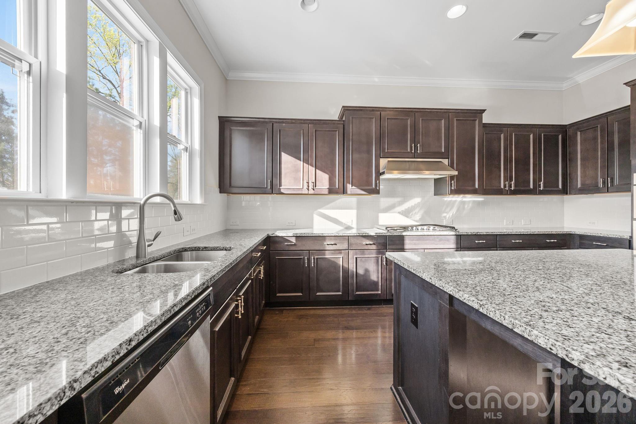 1221 Violet Court Fort Mill, SC 29708 - Photo 17 of 48 a kitchen with a sink stove top oven and cabinets