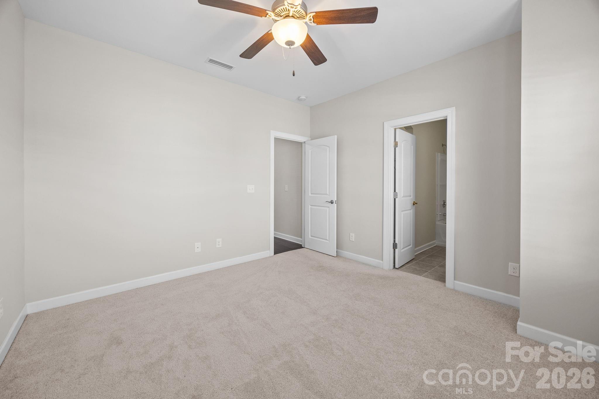 1221 Violet Court Fort Mill, SC 29708 - Photo 26 of 48 a view of an empty room and chandelier fan
