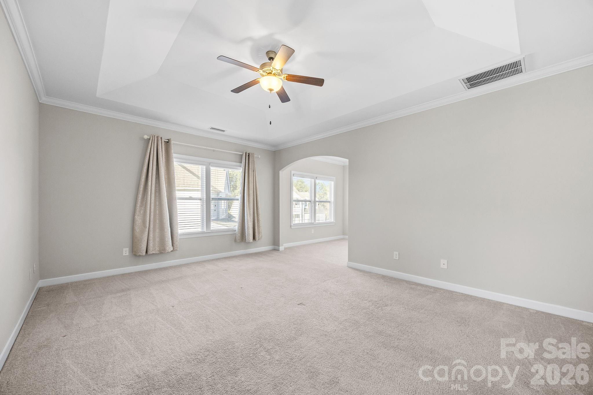 1221 Violet Court Fort Mill, SC 29708 - Photo 28 of 48 a view of an empty room with chandelier fan and a window