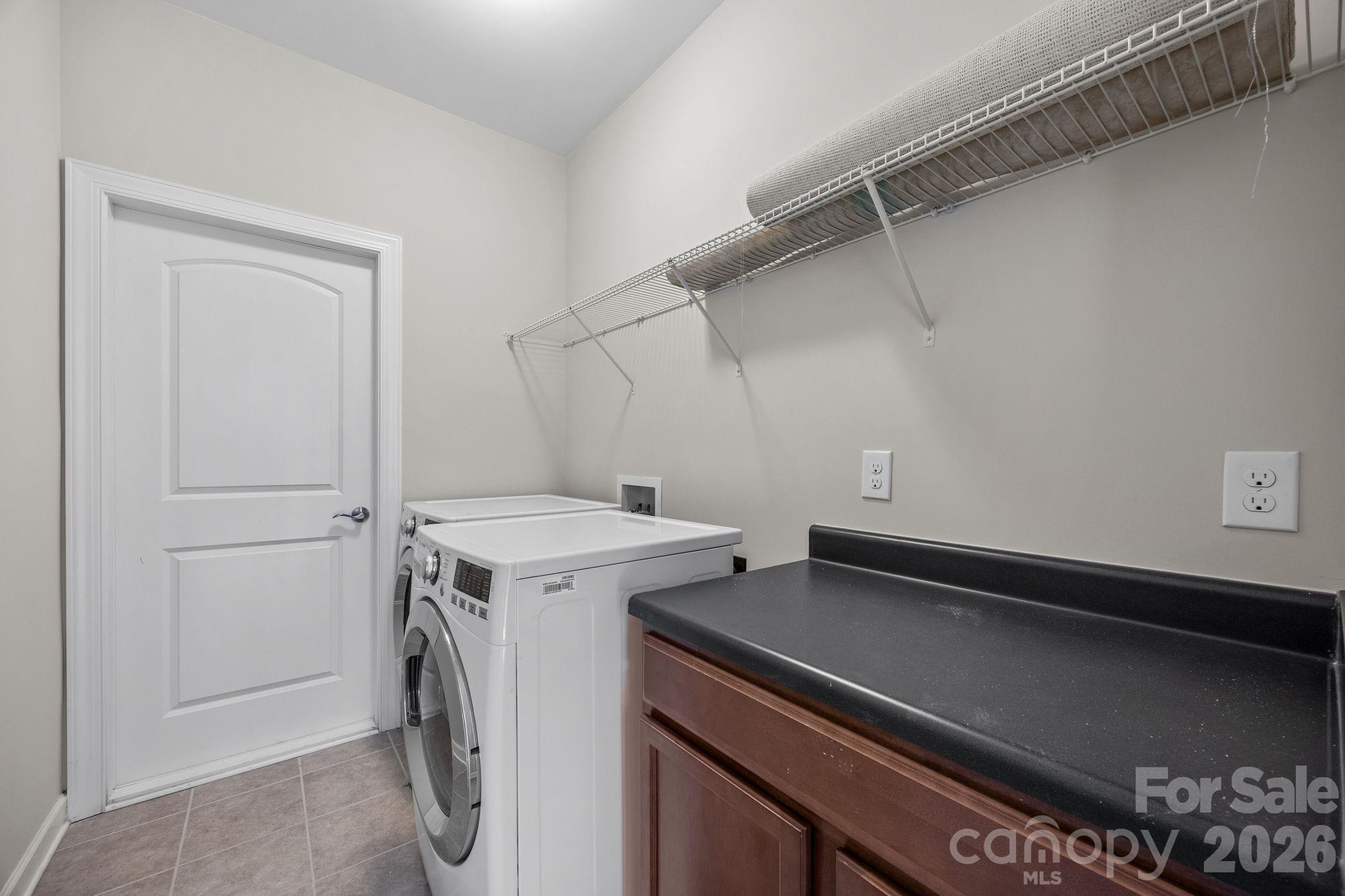 1221 Violet Court Fort Mill, SC 29708 - Photo 33 of 48 a utility room with dryer and washer