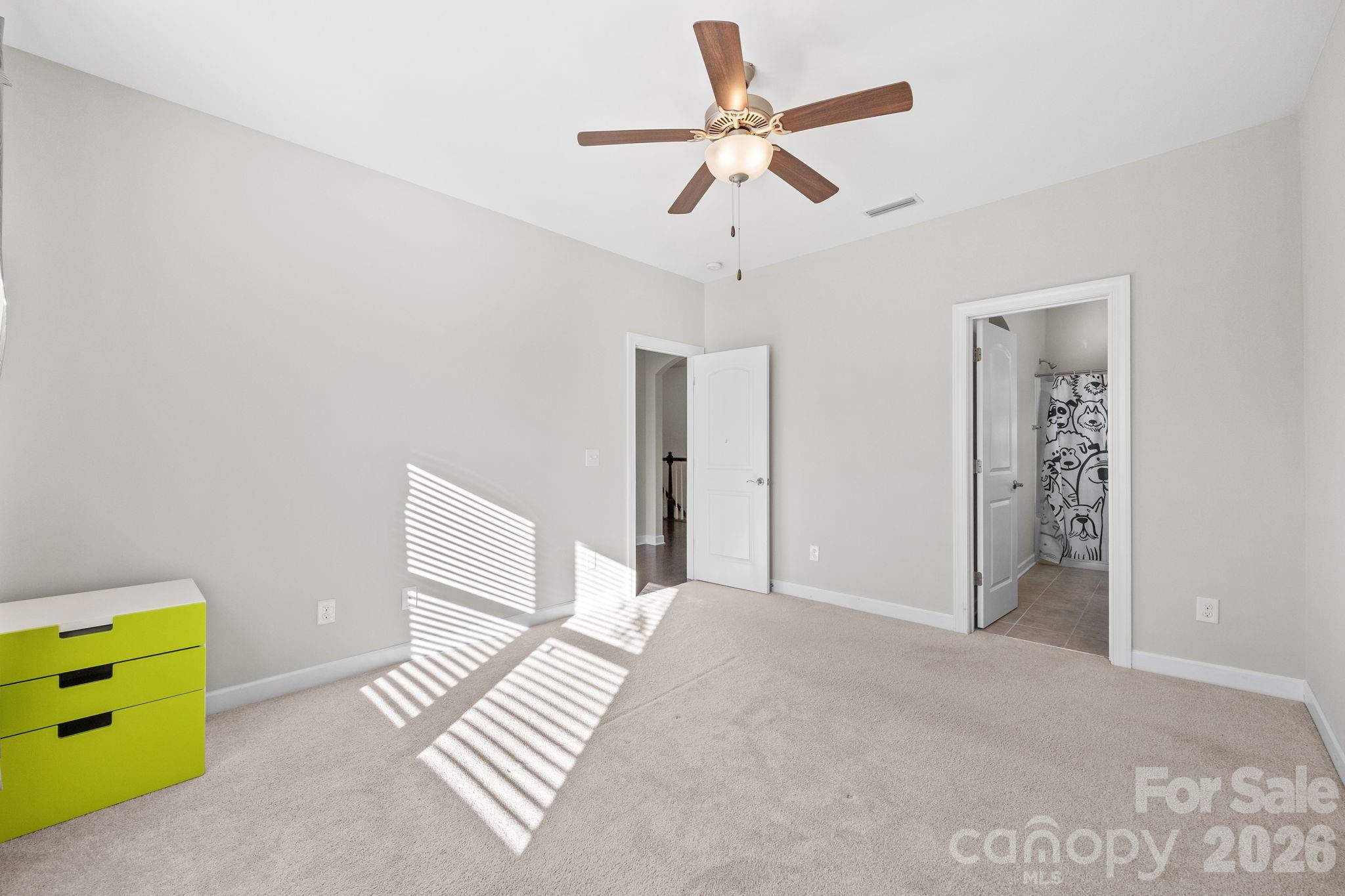 1221 Violet Court Fort Mill, SC 29708 - Photo 37 of 48 a view of room with hardwood floor and ceiling fan
