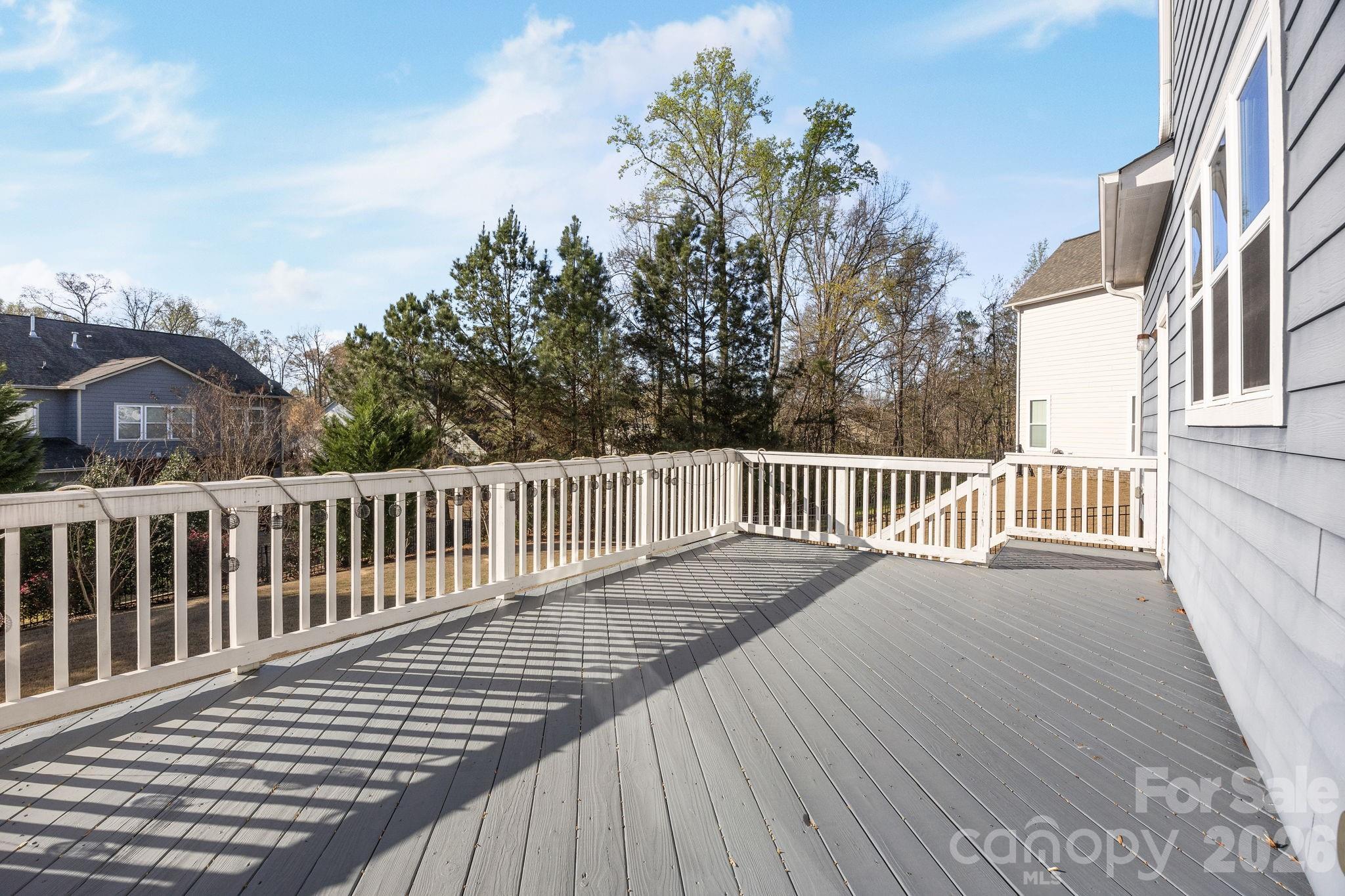 1221 Violet Court Fort Mill, SC 29708 - Photo 42 of 48 a view of a wooden roof with wooden floor and fence