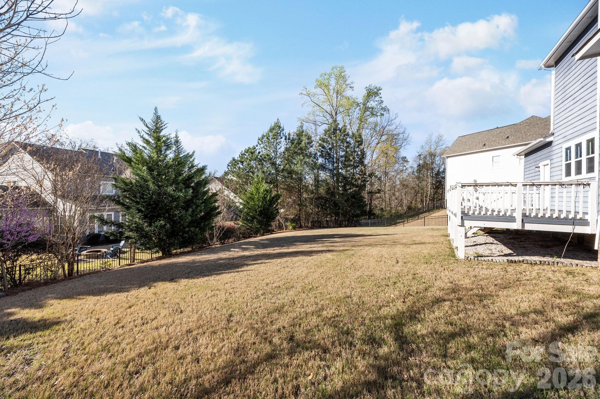 1221 Violet Court Fort Mill, SC 29708 - Photo 43 of 48 a view of a yard with plants and trees