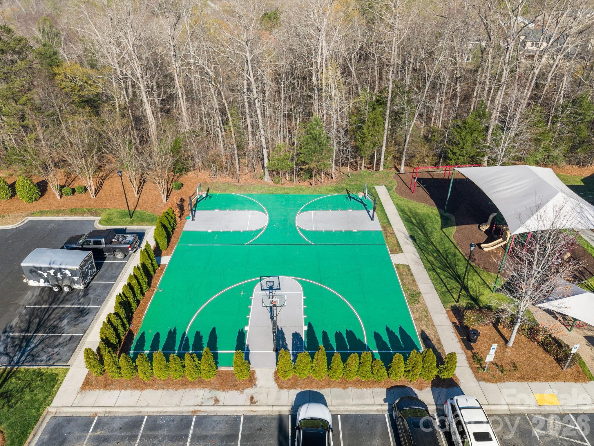 1221 Violet Court Fort Mill, SC 29708 - Photo 44 of 48 an aerial view of a swimming pool patio and outdoor seating