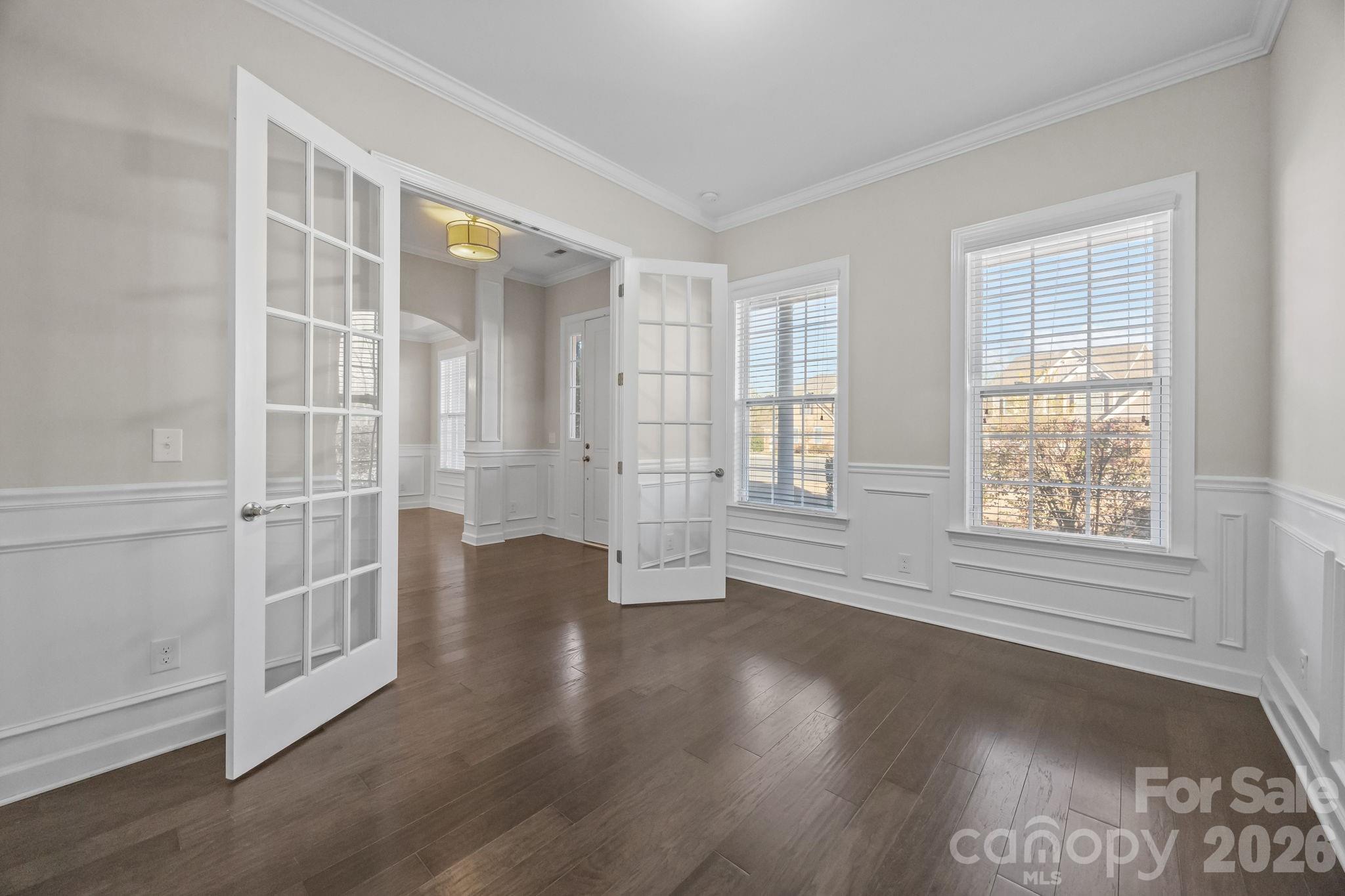 1221 Violet Court Fort Mill, SC 29708 - Photo 5 of 48 an empty room with wooden floor and windows