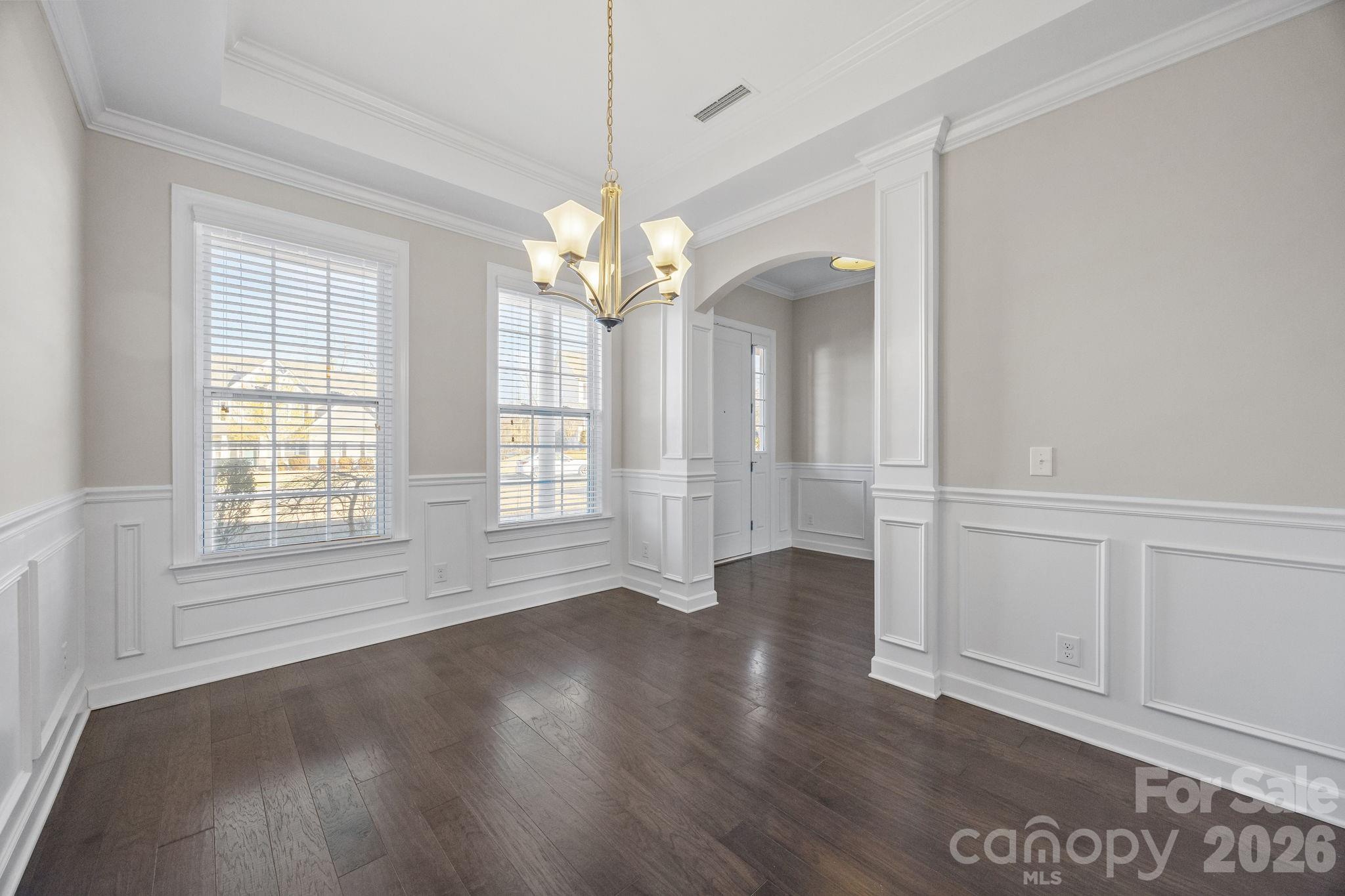 1221 Violet Court Fort Mill, SC 29708 - Photo 9 of 48 a view of an empty room with wooden floor and a window