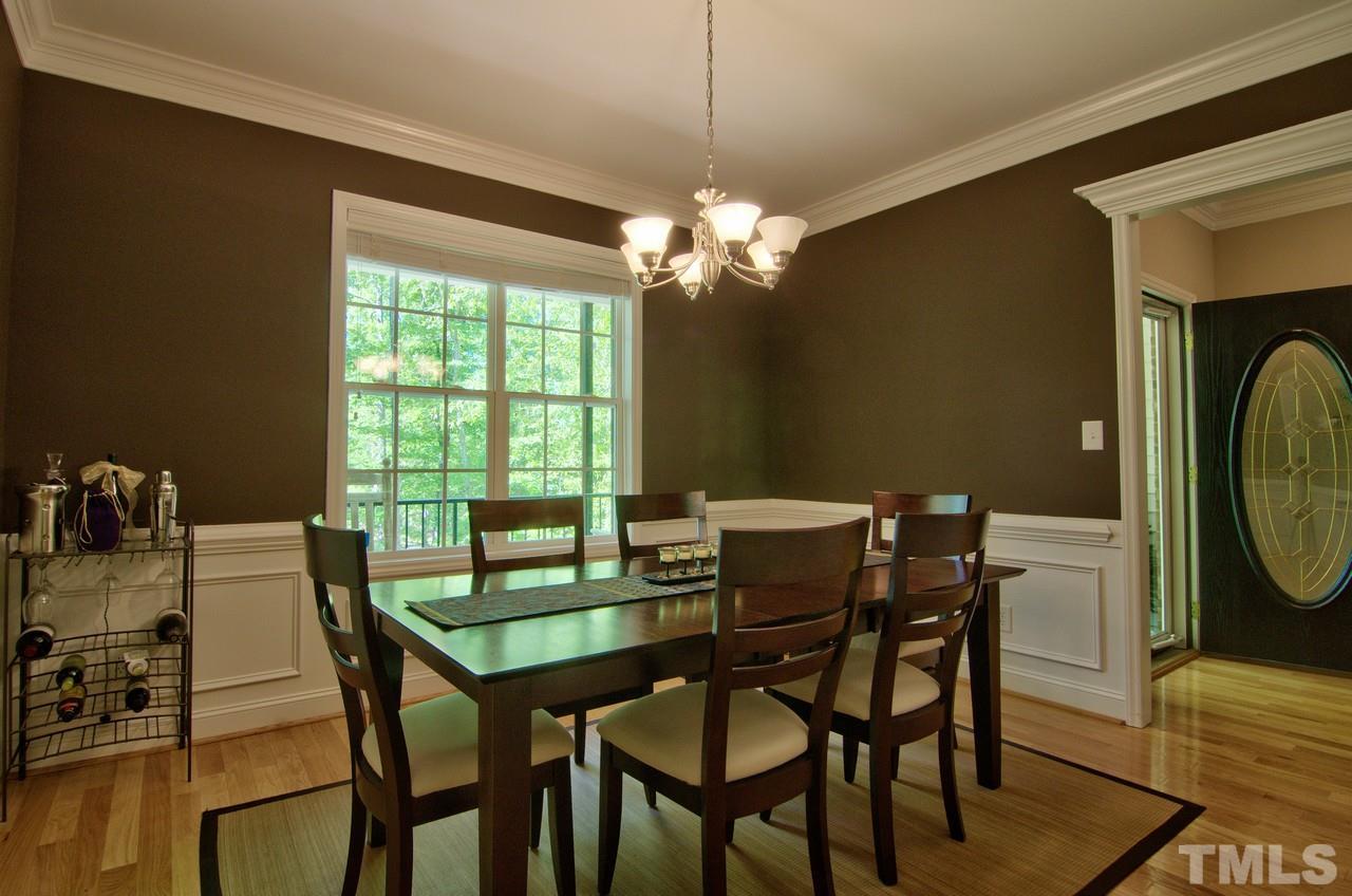 28 Finish Line Road Bahama, NC 27503 - Photo 12 of 25 a view of a dining room with furniture window and outside view