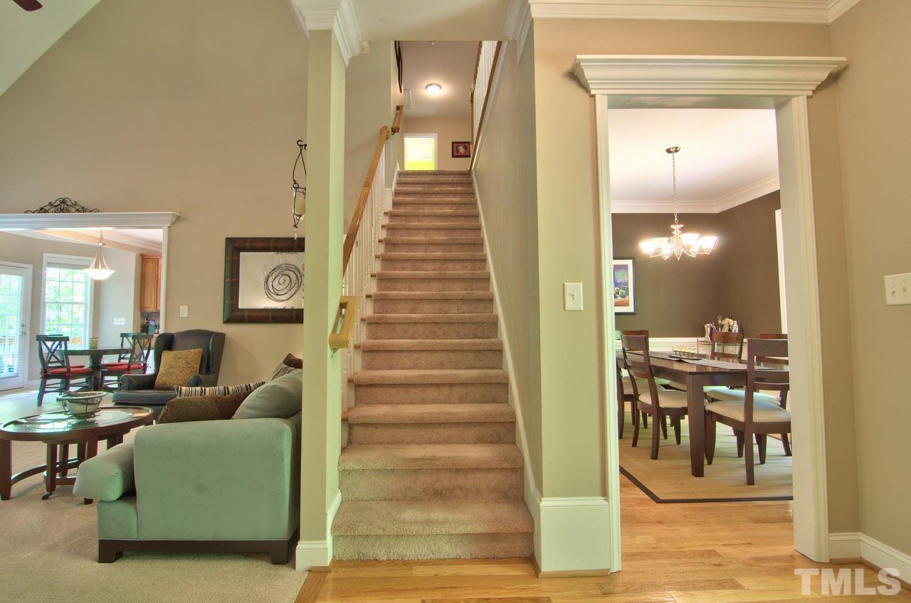 28 Finish Line Road Bahama, NC 27503 - Photo 16 of 25 a view of a livingroom with furniture and staircase