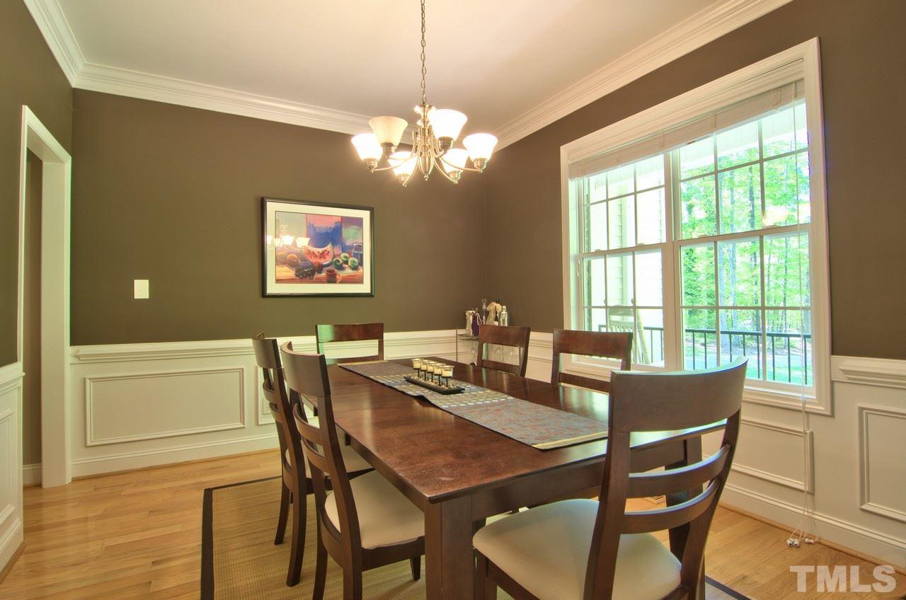 28 Finish Line Road Bahama, NC 27503 - Photo 4 of 25 a view of a dining room with furniture a chandelier and a window